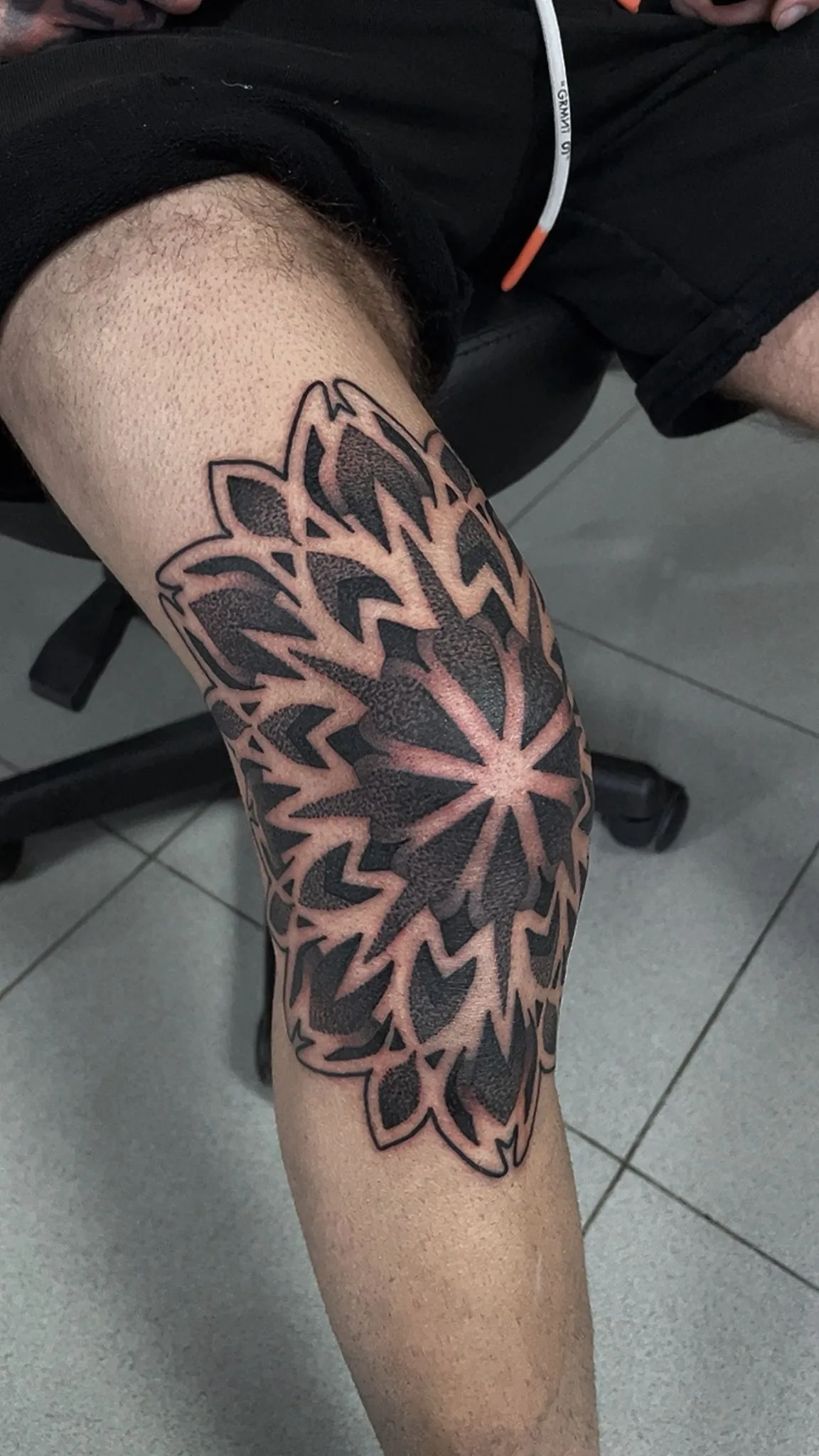 Geometric mandala dotwork piece